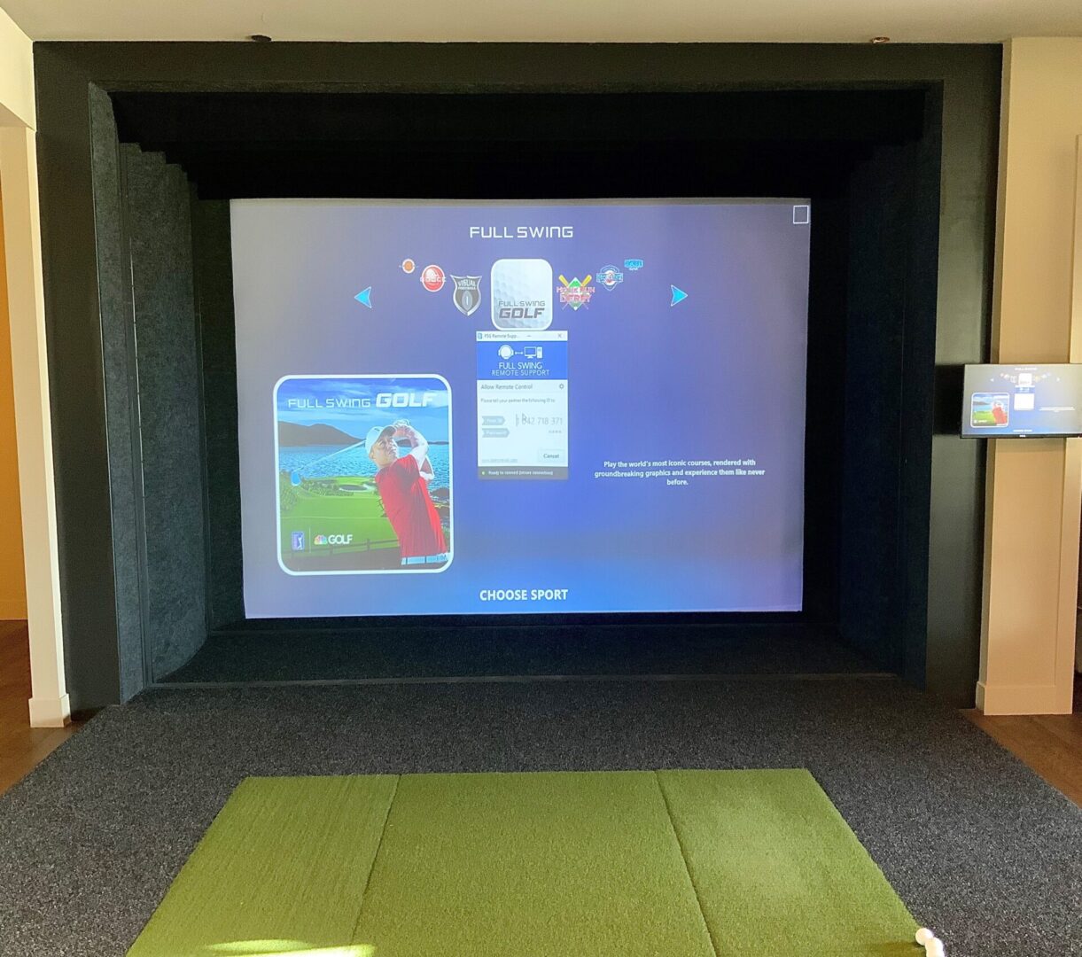 a golf room with an LED Screen